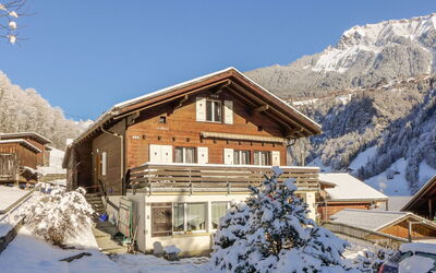 Lauterbrunnen 101: Sky, Building, Snow, Mountain, Property, Plant, Window, House, Tree, Slope