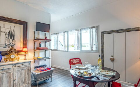 Hoche: Table, Furniture, Property, Cabinetry, Picture Frame, Window, Wood, Interior Design, Chair, Shelf