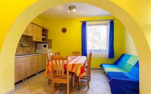 Jókai: Furniture, Table, Window, Chair, Building, Cabinetry, Orange, Yellow, Interior Design, Wood