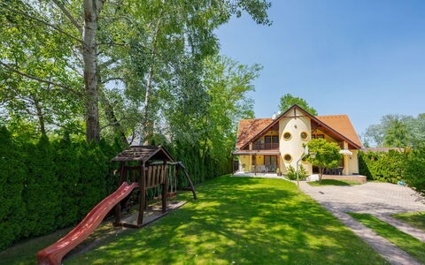 Jókai: House, Shrub, Home, Residential Area, Cottage, Human Settlement, Lawn, Garden, Estate, Farmhouse