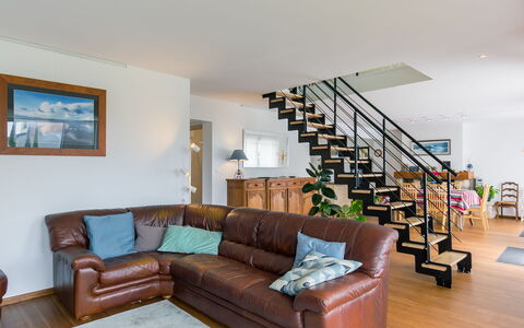 La Grève Bleue: Brown, Furniture, Couch, Table, Picture Frame, Wood, Living Room, Flooring, Comfort, Floor