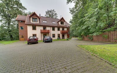Karpacz 500: Plant, Building, Sky, Property, Window, House, Vehicle, Road Surface, Tree, Car