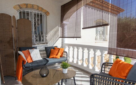 Mys: Property, Furniture, Building, Table, Wood, Interior Design, Shade, Outdoor Furniture, Plant, Chair