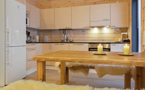 Villa Viima: Furniture, Wood, Flooring, Interior Design, Wood Flooring, Floor, Ceiling, Kitchen, Lighting, Room
