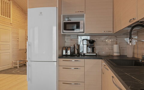 Villa Viima: Kitchen Appliance, Kitchen, Countertop, Major Appliance, Cabinetry, Flooring, Wood, Furniture, Floor, Interior Design