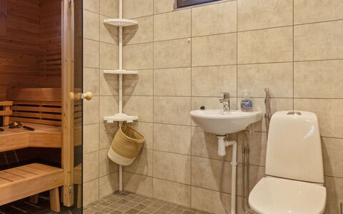Villa Viima: Bathroom, Flooring, Plumbing Fixture, Floor, Bathroom Sink, Wood, Toilet, Interior Design, Sink, Toilet Seat