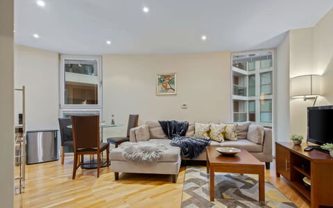 Canary Wharf 302: Furniture, Interior Design, Flooring, Floor, Couch, Wall, Wood, Ceiling, Living Room, Room