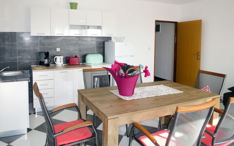 Tomislav: Table, Furniture, Property, Chair, Cabinetry, Countertop, Interior Design, Lighting, Wood, Flooring