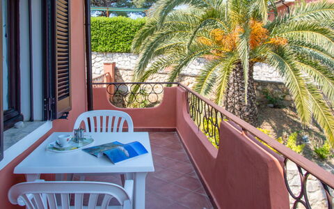Capoliveri 280: Property, Table, Building, Furniture, Chair, Plant, Outdoor Furniture, Architecture, Tree, Wood