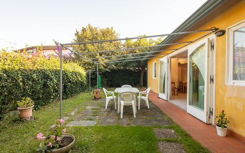 Villa Isola: Plant, Sky, Furniture, Window, Flowerpot, Building, Flower, Chair, Houseplant, Grass