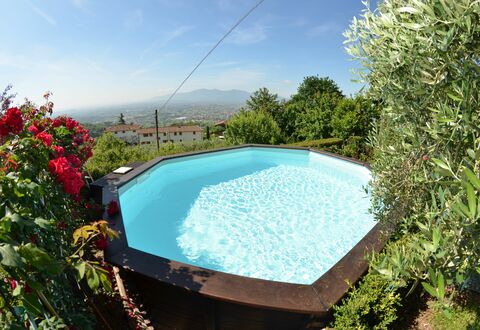Alla Collina Del Sole: Water, Sky, Flower, Swimming Pool, Cloud, Nature, Plant, Rectangle, Shade, Outdoor Furniture
