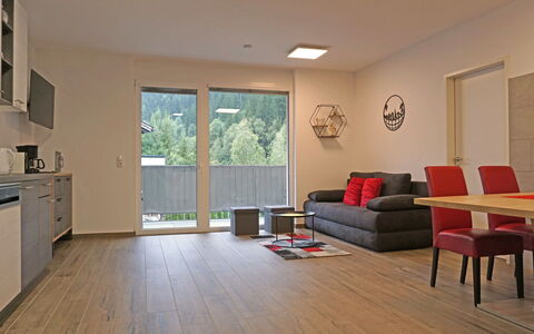 Apart Annabell: Furniture, Cabinetry, Window, Building, Couch, Wood, Lighting, Interior Design, Countertop, Living Room