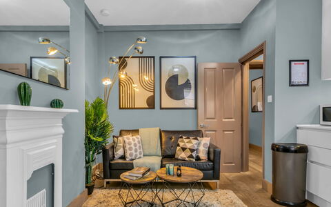 Cleveland Apartments: Furniture, Interior Design, Flooring, Floor, Wall, Room, Wood, Ceiling, Light Fixture, Living Room