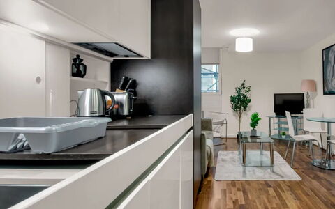 Lambs Passage: Kitchen, Kitchen Appliance, Countertop, Furniture, Interior Design, Flooring, Cabinetry, Major Appliance, Ceiling, Home Appliance