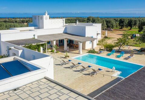Masseria Tufo Bianco: Building, Sky, Property, Swimming Pool, Water, Azure, Tree, Outdoor Furniture, Shade, Architecture