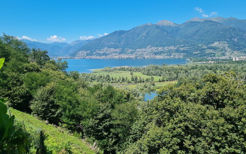 Casa Cavriana: Sky, Water, Mountain, Plant, Green, Azure, Natural Landscape, Tree, Cloud, Lake