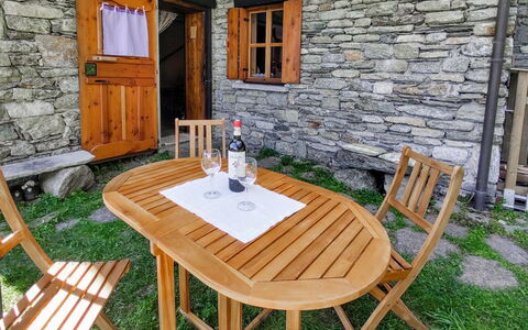 Salargo: Furniture, Table, Plant, Property, Window, Building, Chair, Outdoor Table, Wood, Outdoor Furniture