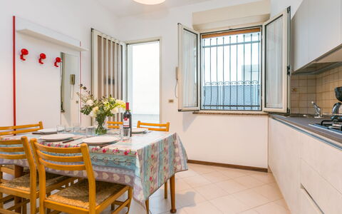Lignano Sabbiadoro 655: Table, Property, Building, Sky, Window, Wood, Interior Design, Cloud, Lighting, Outdoor Furniture