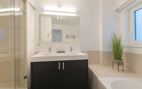 Miramar with Terrace: Mirror, Tap, Plumbing Fixture, Sink, Building, Bathroom Sink, Bathroom, Bathroom Cabinet, Window