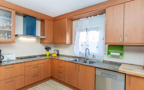 Villa Cantos: Kitchen, Countertop, Cabinetry, Kitchen Appliance, Flooring, Major Appliance, Furniture, Interior Design, Wood, Floor