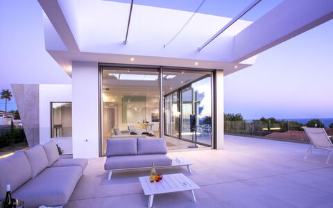 Villa Halcon al Mar: Property, Furniture, Table, Building, Couch, Sky, Azure, Blue, Window, Shade