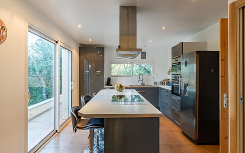 Villa Boccajo: Building, Cabinetry, Countertop, Furniture, Wood, House, Table, Interior Design, Hall, Kitchen