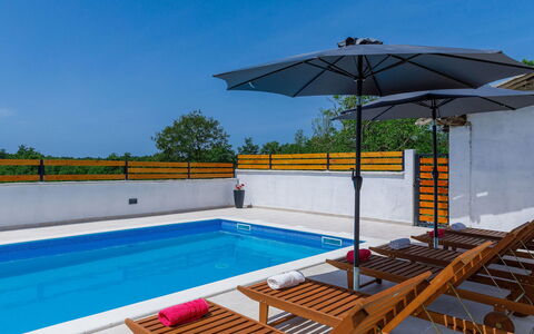 Villa Mate i Kate: Water, Building, Sky, Swimming Pool, Shade, Umbrella, Chair, Outdoor Furniture, Tree, Sunlounger