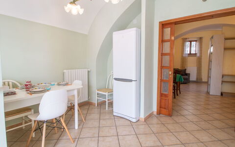 Kiwi e L'Uva - Tuscia: Furniture, Property, Table, Chair, Door, Wood, Lighting, Interior Design, Architecture