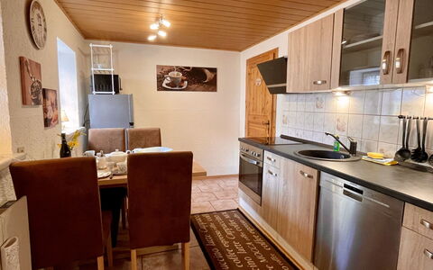 Sissi: Picture Frame, Cabinetry, Countertop, Kitchen Stove, Kitchen Appliance, Wood, Interior Design, Chair, Kitchen, Flooring