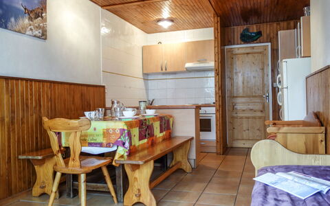 Tignes 245: Furniture, Property, Table, Cabinetry, Wood, Interior Design, Architecture, Chair, Floor, Picture Frame