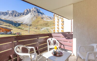 Tignes 320: Furniture, Property, Table, Sky, Building, Chair, Shade, Flowerpot, Mountain, Wood