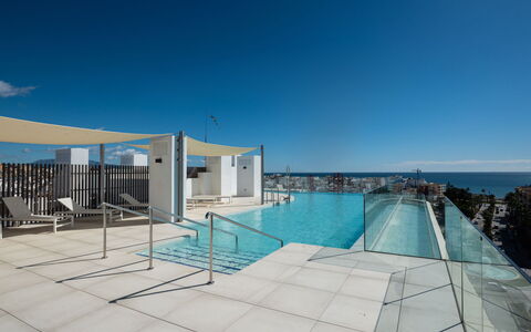 Estepona Roof Top View 4: Sky, Water, Building, Swimming Pool, Azure, House, Shade, Outdoor Furniture, Urban Design, Condominium