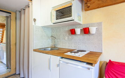 Rond Point des Pistes (Val Claret) 330.18: Cabinetry, Building, Wood, Countertop, Sink, Interior Design, Floor, Kitchen, Flooring, Hardwood