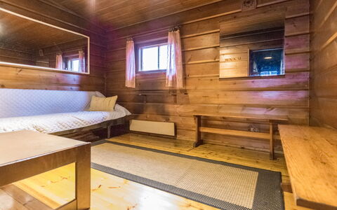 Metsäpirtti: Bed, Furniture, Bedroom, Interior Design, Bedding, Bed Sheet, Flooring, Wood, Floor, Room