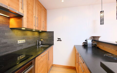 Tignes 340: Countertop, Property, Room, Kitchen, Cabinetry, Furniture, Interior Design, Yellow, Building, House