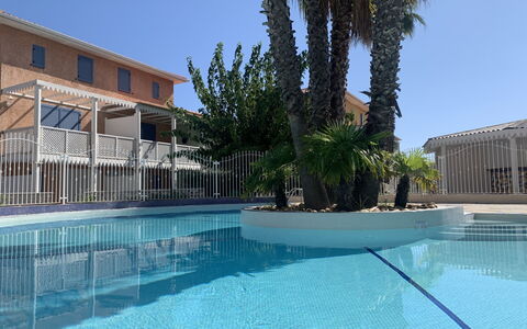 La Belle Créole: Water, Sky, Plant, Azure, Swimming Pool, Building, Tree, Arecales, Composite Material, Leisure
