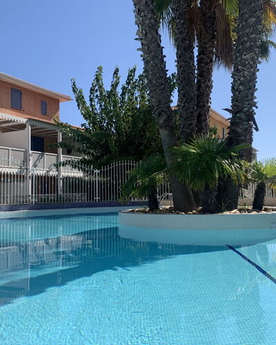 La Belle Créole: Water, Sky, Plant, Azure, Swimming Pool, Building, Tree, Arecales, Composite Material, Leisure