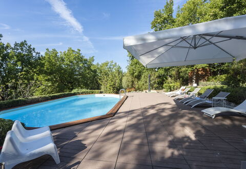 Villa Monteresi: Sky, Water, Cloud, Swimming Pool, Shade, Plant, Outdoor Furniture, Architecture, Tree, Sunlounger