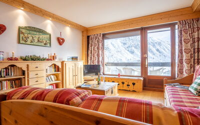 Tignes 480: Cabinetry, Furniture, Picture Frame, Building, Window, Wood, Comfort, Orange, Window Blind, Textile