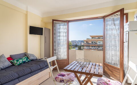 Le Lavandou 212: Apartment, Interior Design, Furniture, Floor, Balcony, Condominium, Chair, Wood Stain, Design, Daylighting