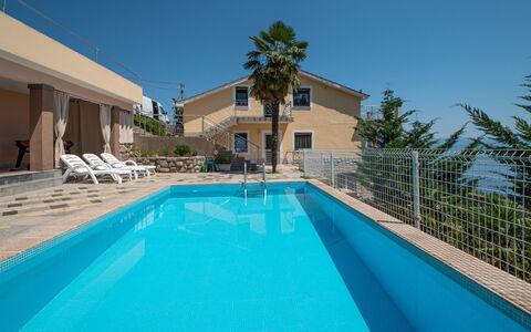 La Mer: Water, Plant, Sky, Building, Property, Swimming Pool, Azure, Tree, Shade, House