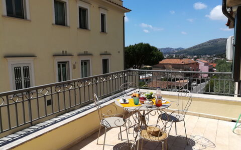 La Terrazza di Dinky: Sky, Property, Window, Building, Flowerpot, Table, Outdoor Furniture, Architecture, Chair, Urban Design