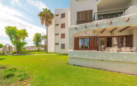 Carabela Front Beach & Pool: Sky, Cloud, Building, Plant, Green, Window, Architecture, Land Lot, Tree, Residential Area