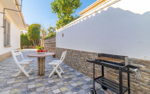 Can Xiroia: Table, Building, Sky, Property, Furniture, Plant, Window, Wood, Flowerpot, Outdoor Table