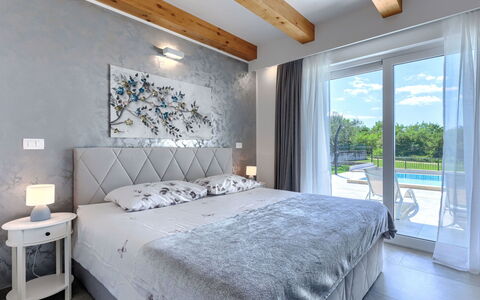 Villa Civitan: Furniture, Interior Design, Bedroom, Flooring, Floor, Bed, Ceiling, Linens, Home, Room