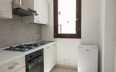 Luxury Courtyard 114.2: Cabinetry, Countertop, Kitchen Sink, Tap, Sink, Property, Building, Kitchen Stove, Plumbing Fixture, Kitchen