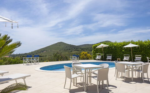 Collina delle Stelle: Cloud, Sky, Table, Property, Furniture, Azure, Chair, Swimming Pool, Outdoor Furniture, Shade