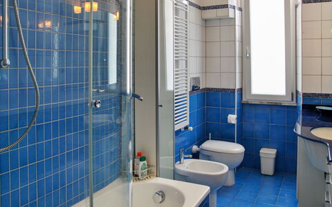 Sotto Il Segno dei Pesci: Plumbing Fixture, Mirror, Tap, Property, Sink, Bathroom, Purple, Bathroom Sink, Azure, Building