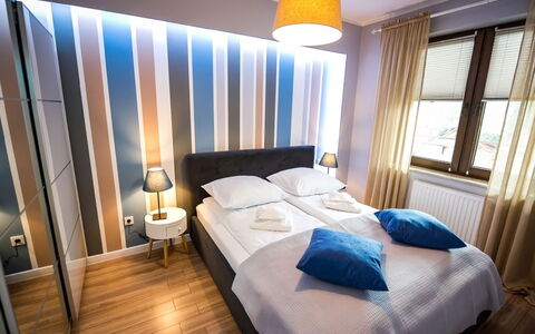 Zielony Zdrój: Furniture, Property, Comfort, Light, Building, Azure, Wood, Bed Frame, Lamp, Pillow