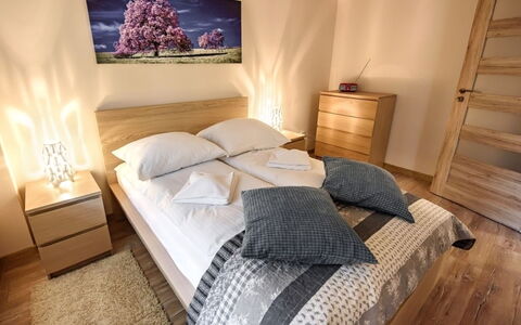 Zielony Zdrój: Furniture, Comfort, Building, Wood, Lighting, Bed Frame, Lamp, Cabinetry, Floor, Flooring